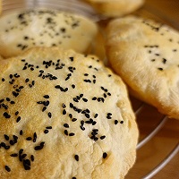 Freshly baked flatbread sprinkled with nigella seeds