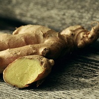 Fresh ginger root cut in half