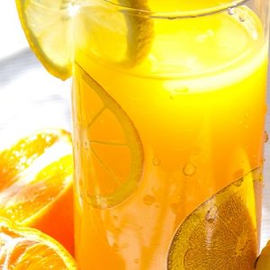 Glass of citrus juice with slices of lemon, a good source of Vitamin C