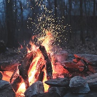 Camp fire in the evening