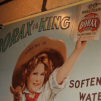 Vintage advertising poster with a young healthy looking girl holding a box or borax