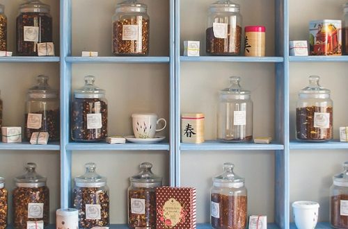 Jars of herbal remedies on a shop shelf